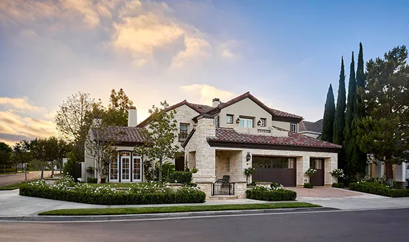 A charming home with a spacious garage and well-maintained landscaping, featured by Expert Property Valuation Specialists.