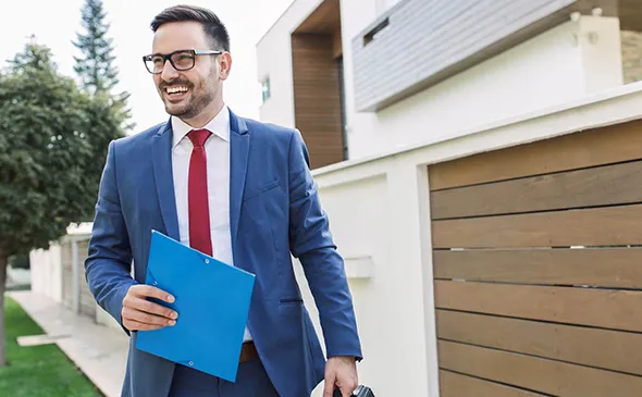 A welcoming Local Downsizing Real Estate office with a friendly agent ready to assist clients in finding smaller homes.